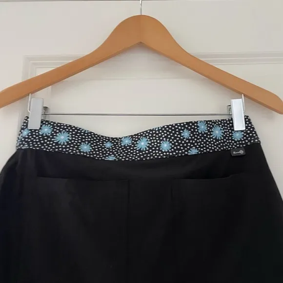 Belyn Key Onyx Moonstruck Floral Ruffle Golf Skort UPF 50