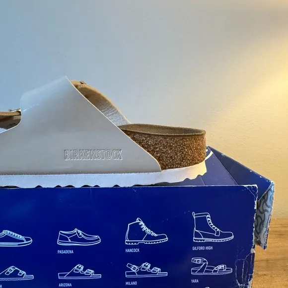 Birkenstock Arizona Gold Buckle High Shine Sandal in Sand Color