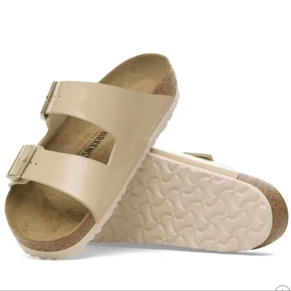 Birkenstock Arizona Gold Buckle High Shine Sandal in Sand Color