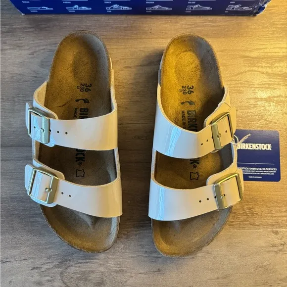 Birkenstock Arizona Gold Buckle High Shine Sandal in Sand Color