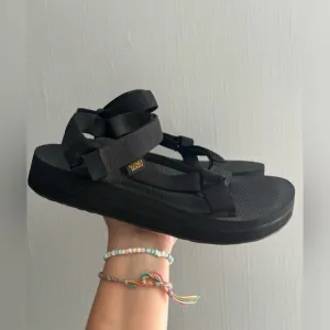Black mid form universal Teva sandals Size 9