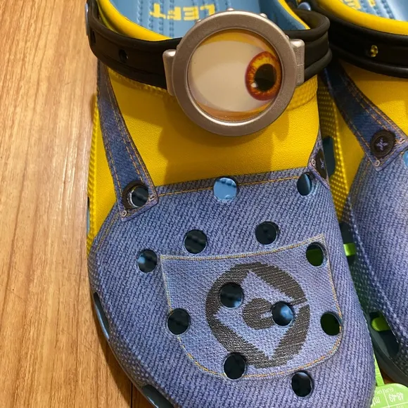 CROCS Blue and Yellow Sandals with Playful Design