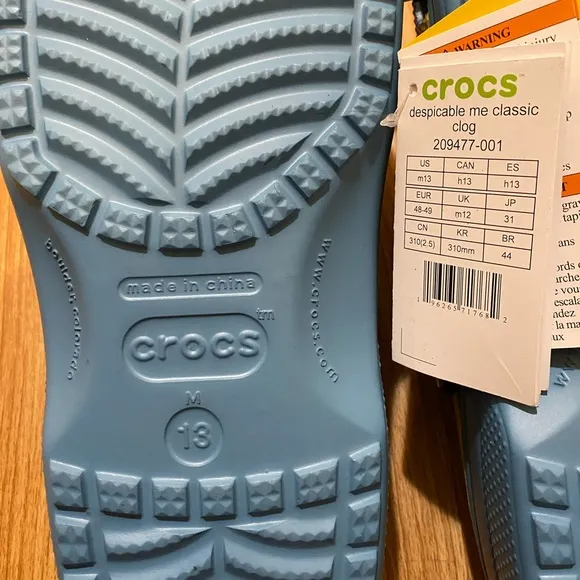 CROCS Blue and Yellow Sandals with Playful Design
