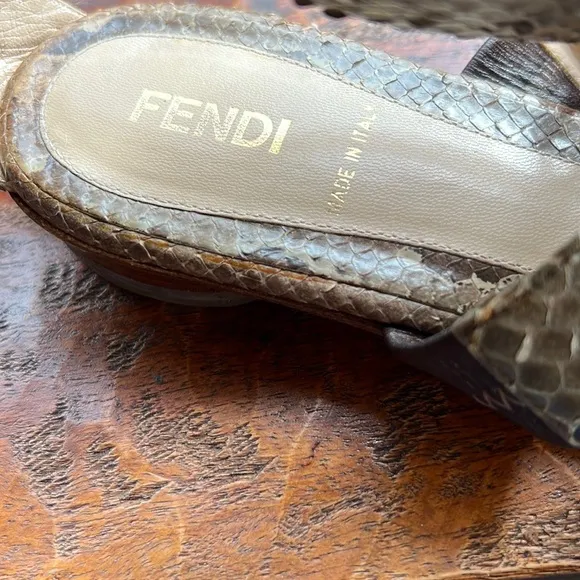 Fendi Snakeskin Flats with ankle strap, metal embellishments and vibram soles