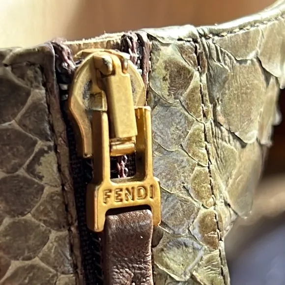 Fendi Snakeskin Flats with ankle strap, metal embellishments and vibram soles