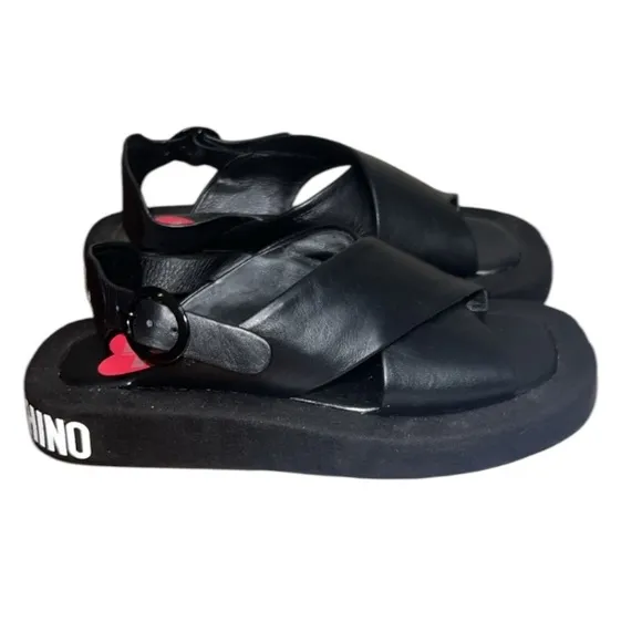 Love Moschino Sandals Black leather crossover pattern with buckle closure sz 38