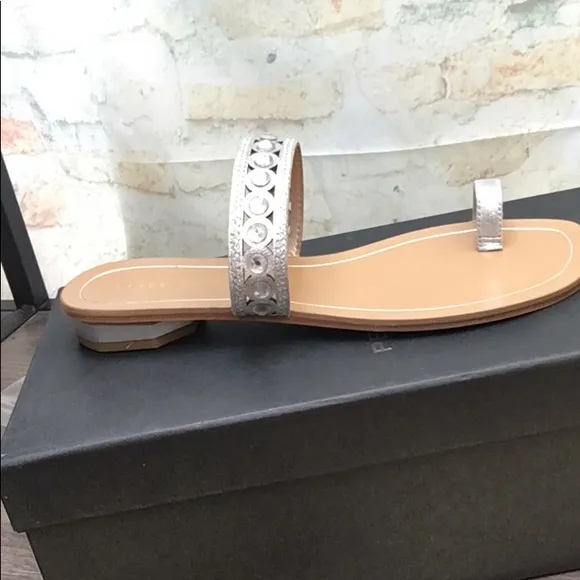 New Pelle Moda Sleek Laser Cut Silver Embellished Slip On Flat Sandals