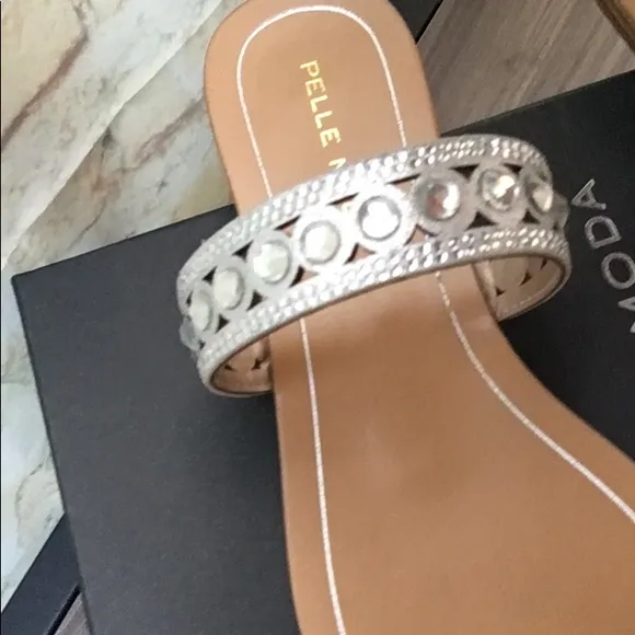 New Pelle Moda Sleek Laser Cut Silver Embellished Slip On Flat Sandals