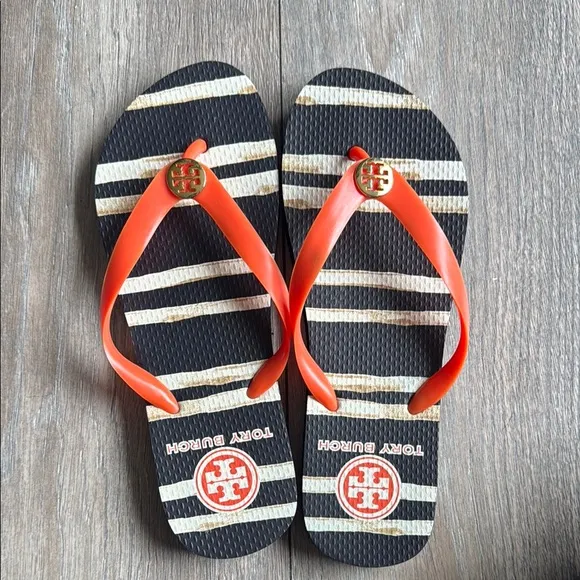 Tory Burch Black and Orange Sandals with Bold Design