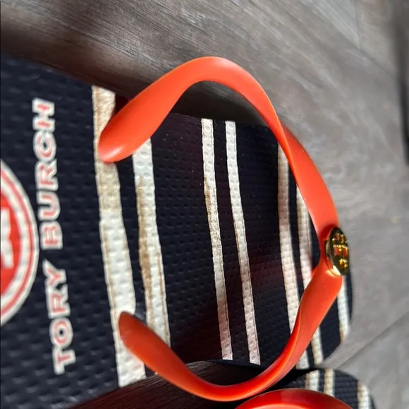 Tory Burch Black and Orange Sandals with Bold Design