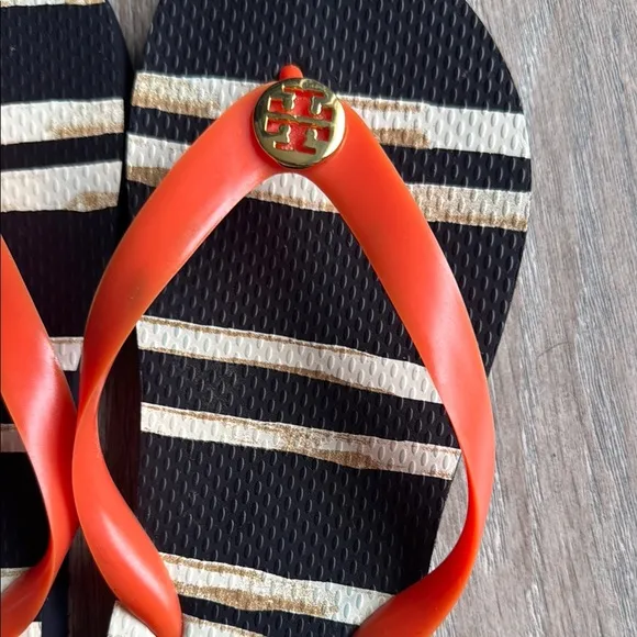 Tory Burch Black and Orange Sandals with Bold Design