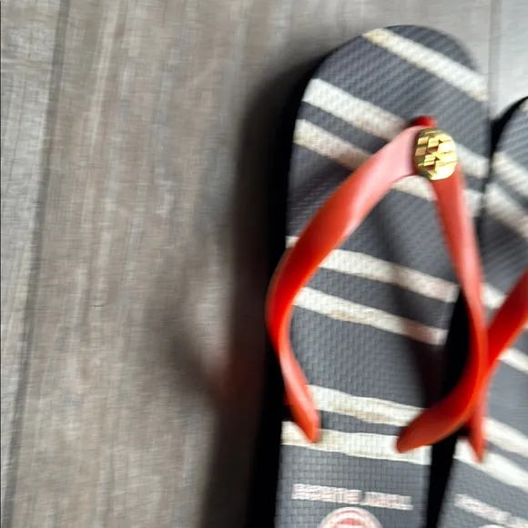 Tory Burch Black and Orange Sandals with Bold Design