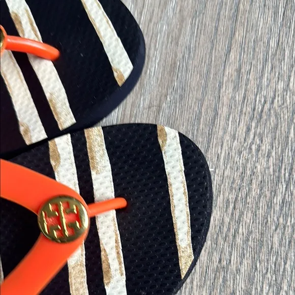 Tory Burch Black and Orange Sandals with Bold Design