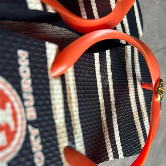 Tory Burch Black and Orange Sandals with Bold Design